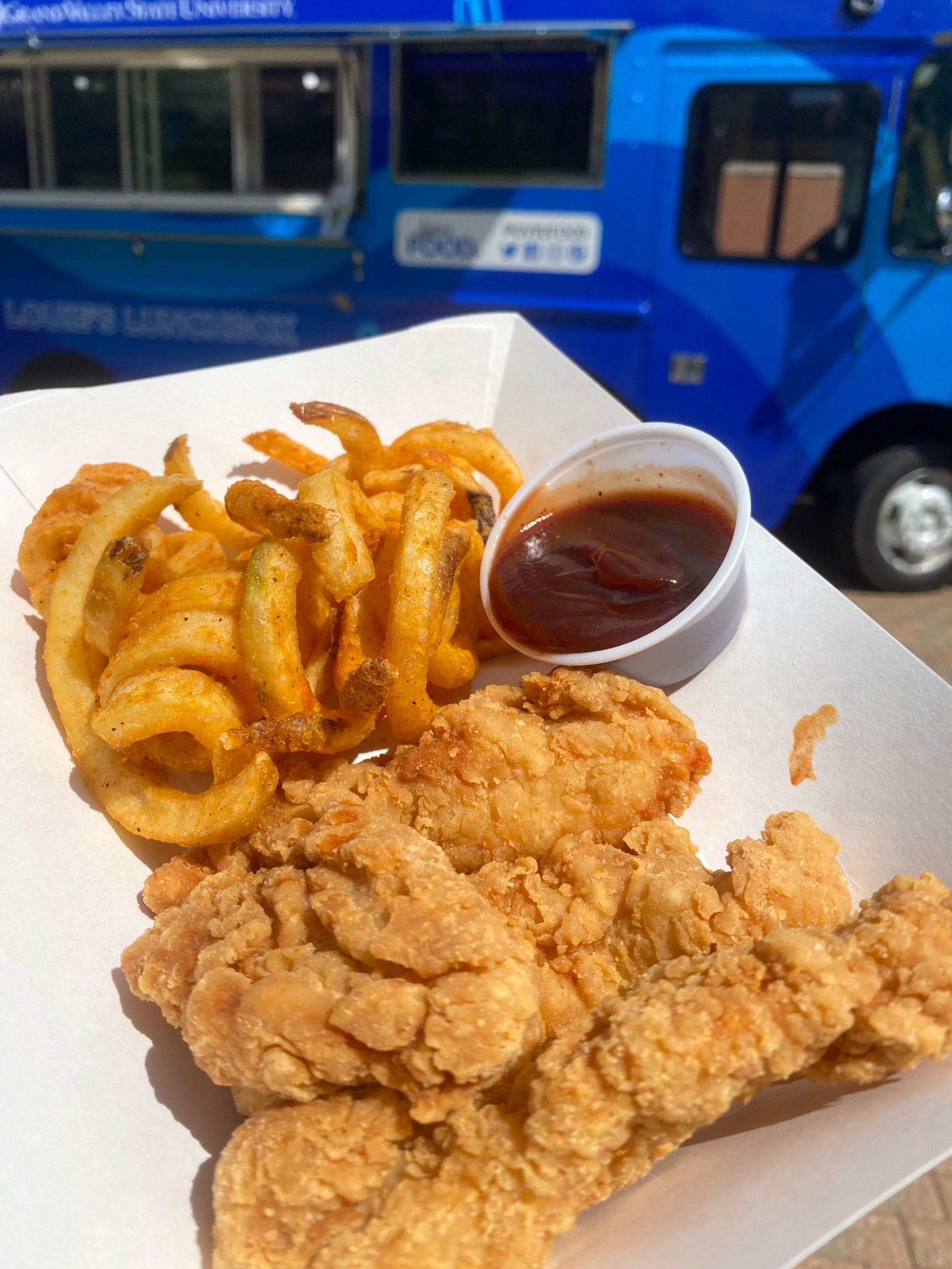 chicken tenders and fries in a basket